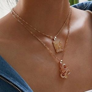 gold dragon and rose necklaces